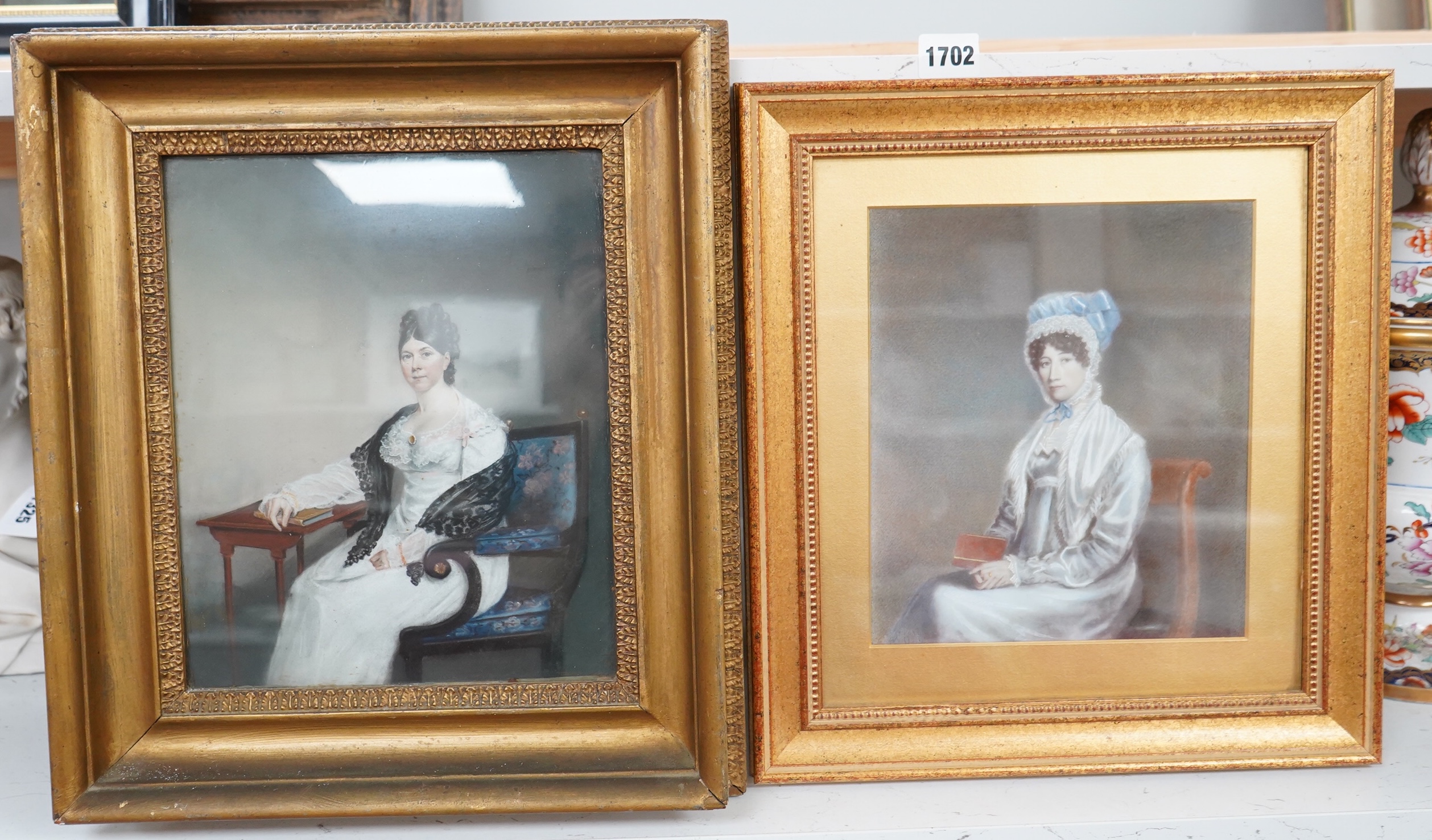 Regency School, Portraits of seated ladies, unsigned, two watercolours on card, largest 26 x 21cm, each gilt framed